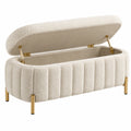 Banc coffre ovale 100 x 45 x 48 cm en tissu bouclette écru avec pieds métalliques dorés style contemporain